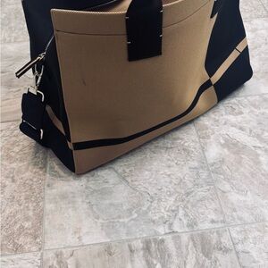 Rothy's Tan and Black Travel Bag Modern Design